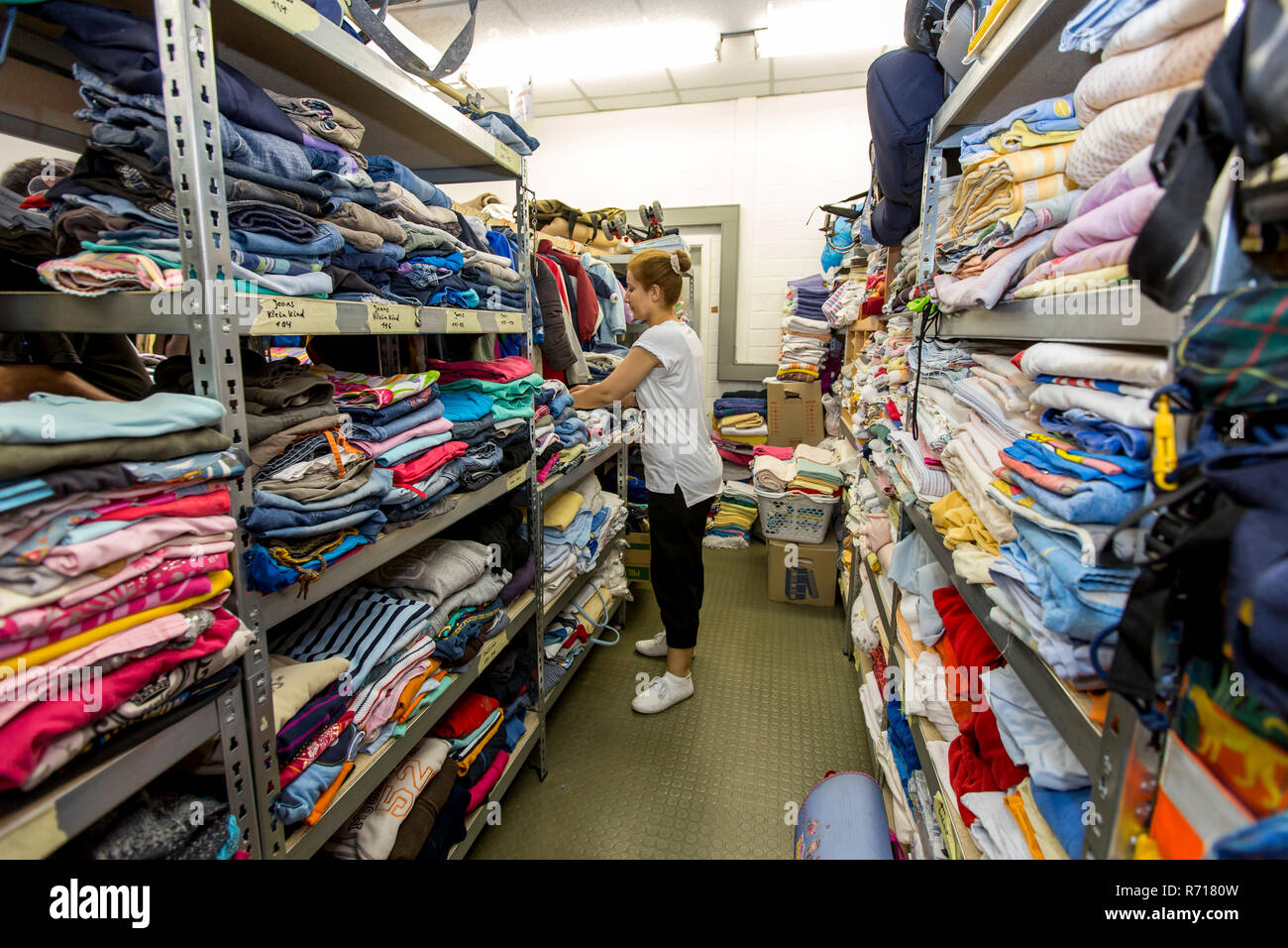 Warehouse with clothing for refugees, Volunteers' Initiative Welcome to Mülheim, Mülheim an der Ruhr, North Rhine-Westphalia Stock Photo