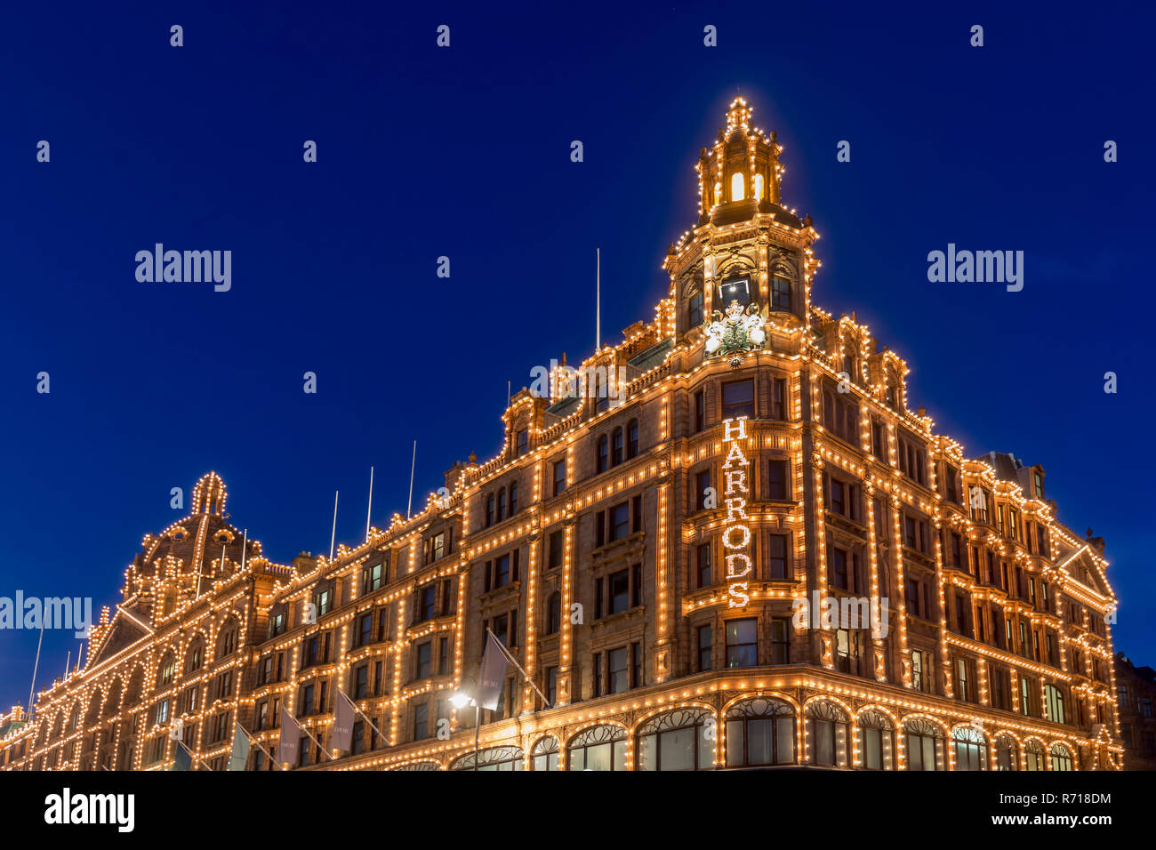 Illuminated department store Harrods, night scene, London, Great Britain Stock Photo