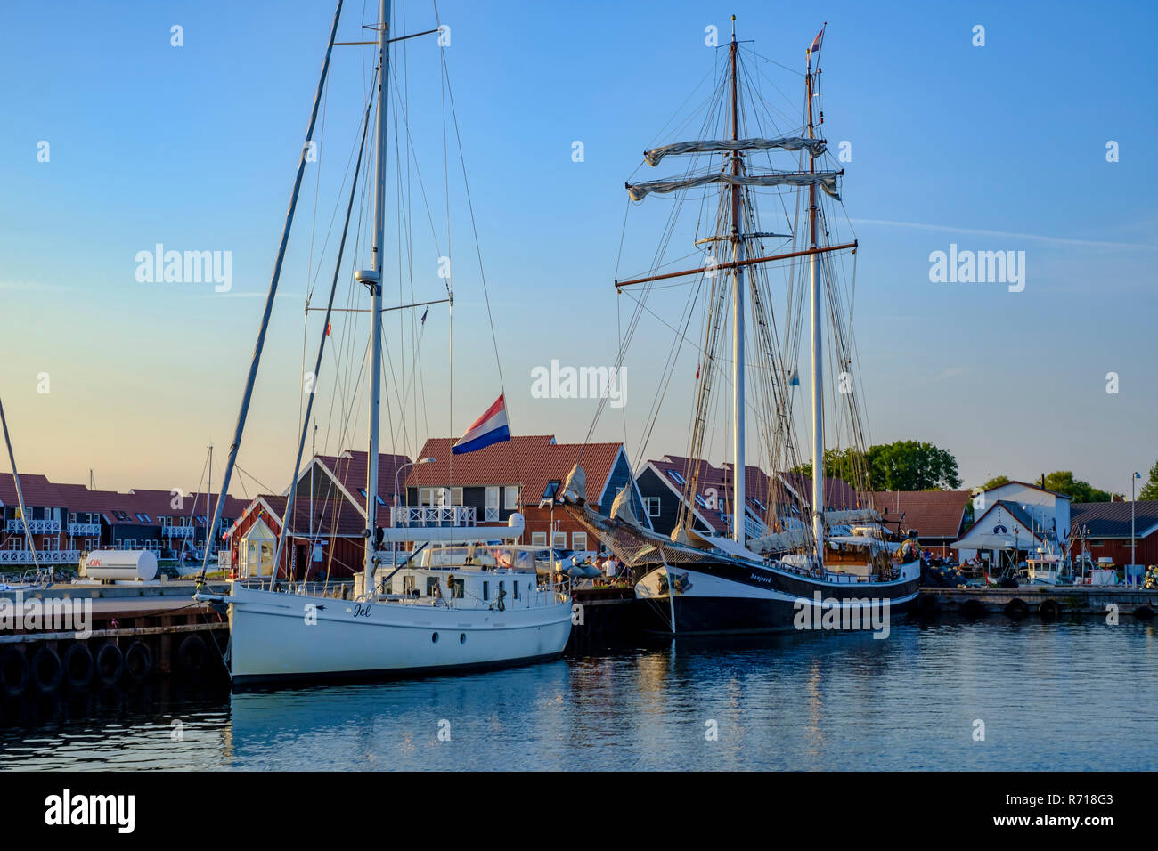 The schooner BANJAARD has moored in the port of Klintholm Havn, Moen Island, Denmark. Stock Photo