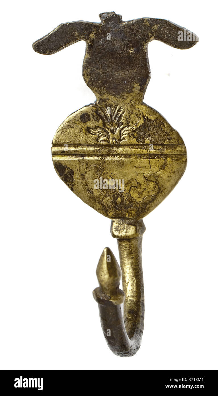 Brass coat with brand On the front, hook fastener bottomfound brass metal,  cast brass coat hook Curve hook with point above collar. Wall plate with  two outstanding ears above the center piece.
