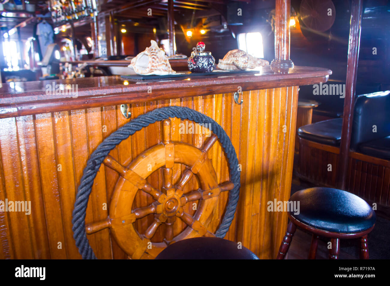 bar with old wooden furniture, pirate themes decor Stock Photo - Alamy