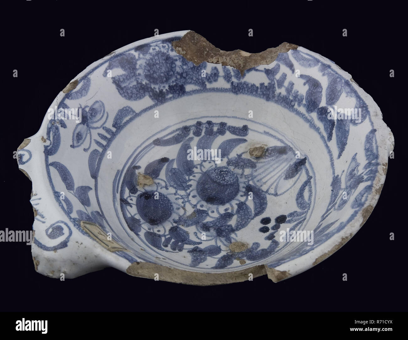 Majolica dish with ears, blue on white, Chinese garden as decor, papkom  bowl crockery holder earth discovery ceramics pottery enamel, archeology  Rotterdam archaeological find in the soil Rotterdam 1940 Stock Photo - Alamy
