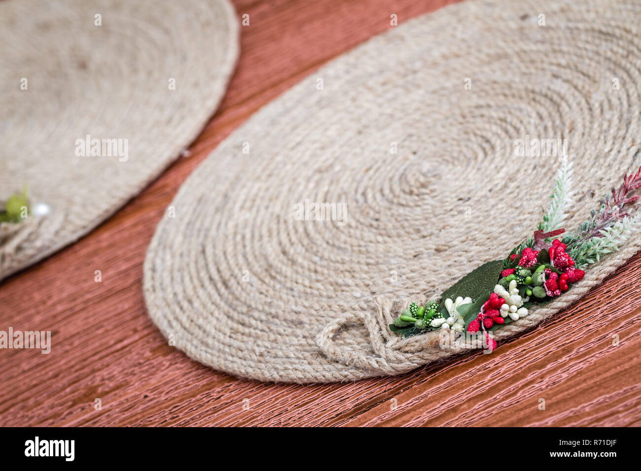 Handmade Table Mat of Jute Rope Twisted in a Spiral Form Stock Photo