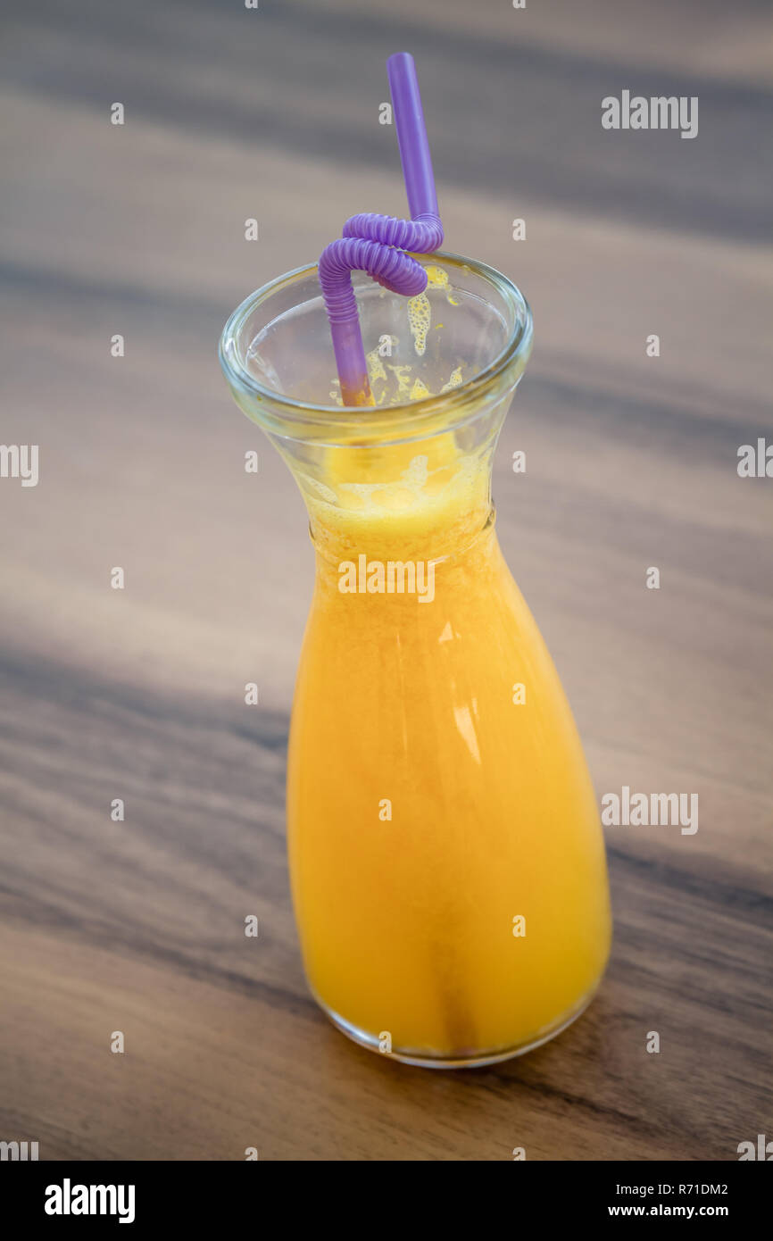 Natural Orange Juice and Straw in a Glass Pitcher Stock Photo Alamy