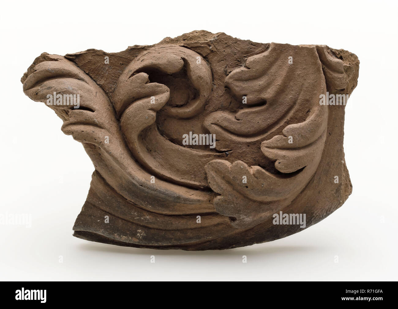Fragment of terracotta ornament, decorated with acanthus leaves in