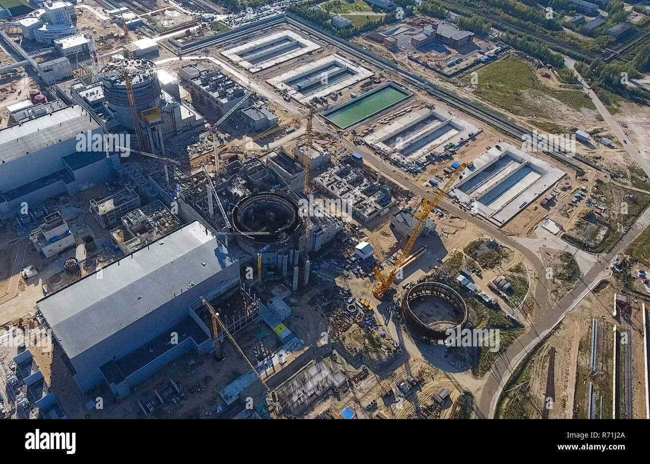 Aerial survey of a nuclear power plant under construction. Installation and construction of a power plant. Nuclear power Stock Photo