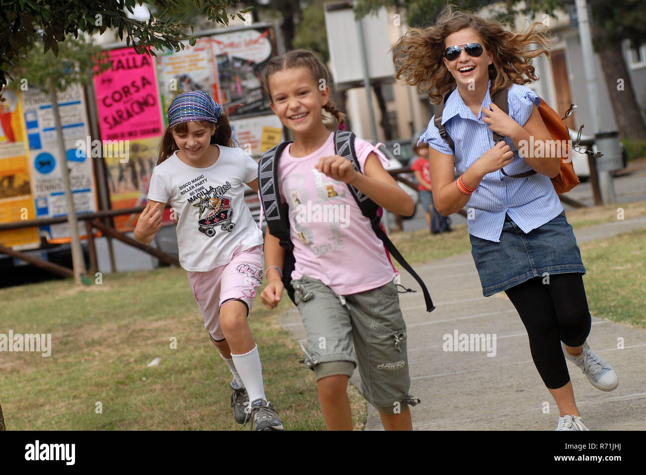 Group of schoolchilds running     Photo © Daiano Cristini/Sintesi/Alamy Stock Photo Stock Photo