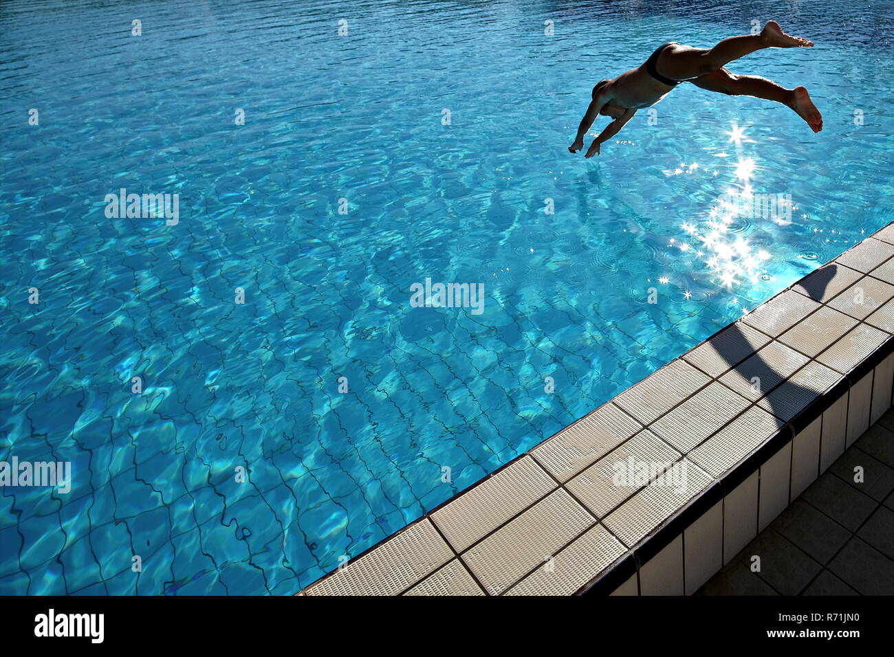 a-dip-in-the-swimming-pool-stock-photo-alamy