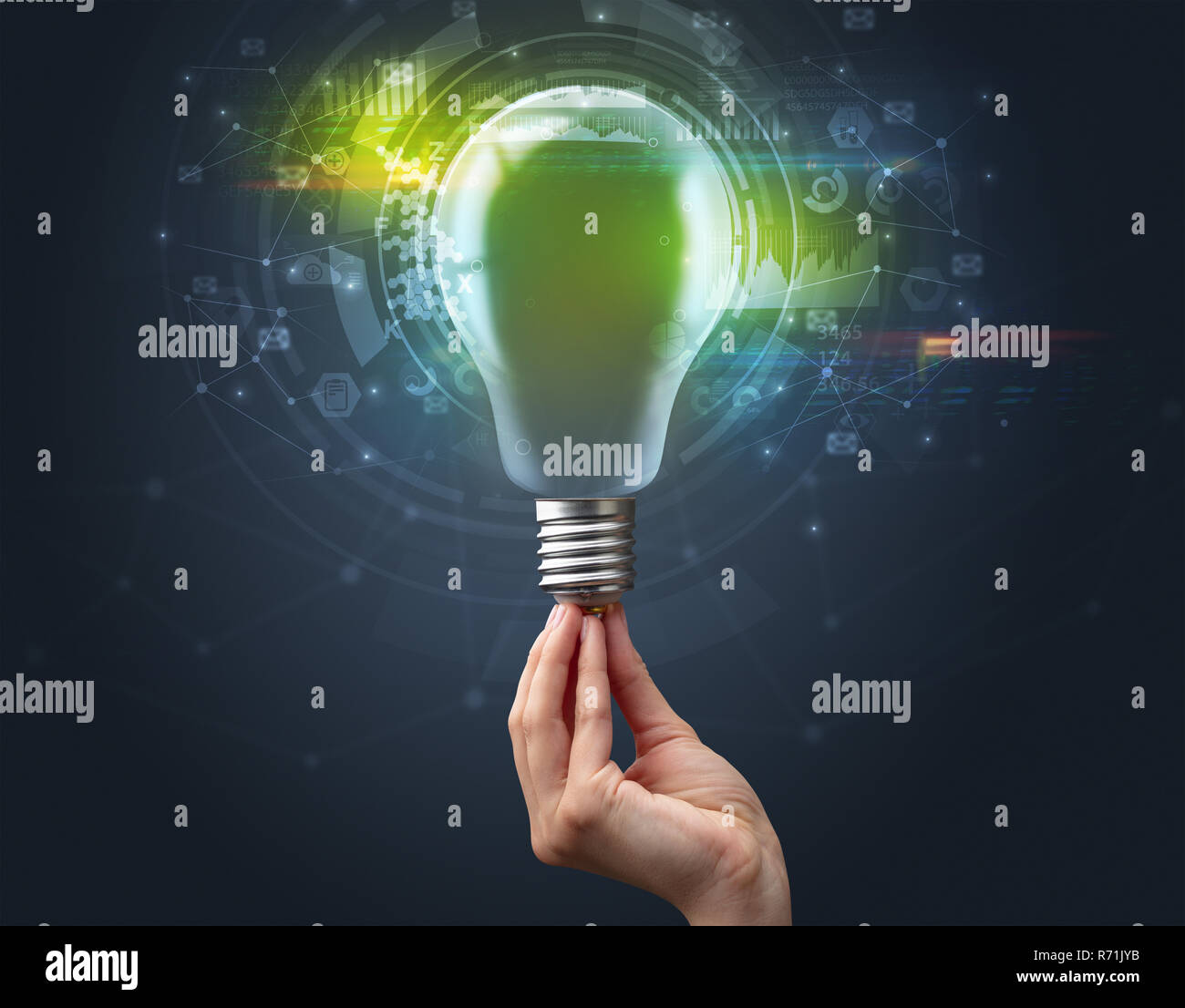 Hand holding light bulb on dark background. New business idea concept ...