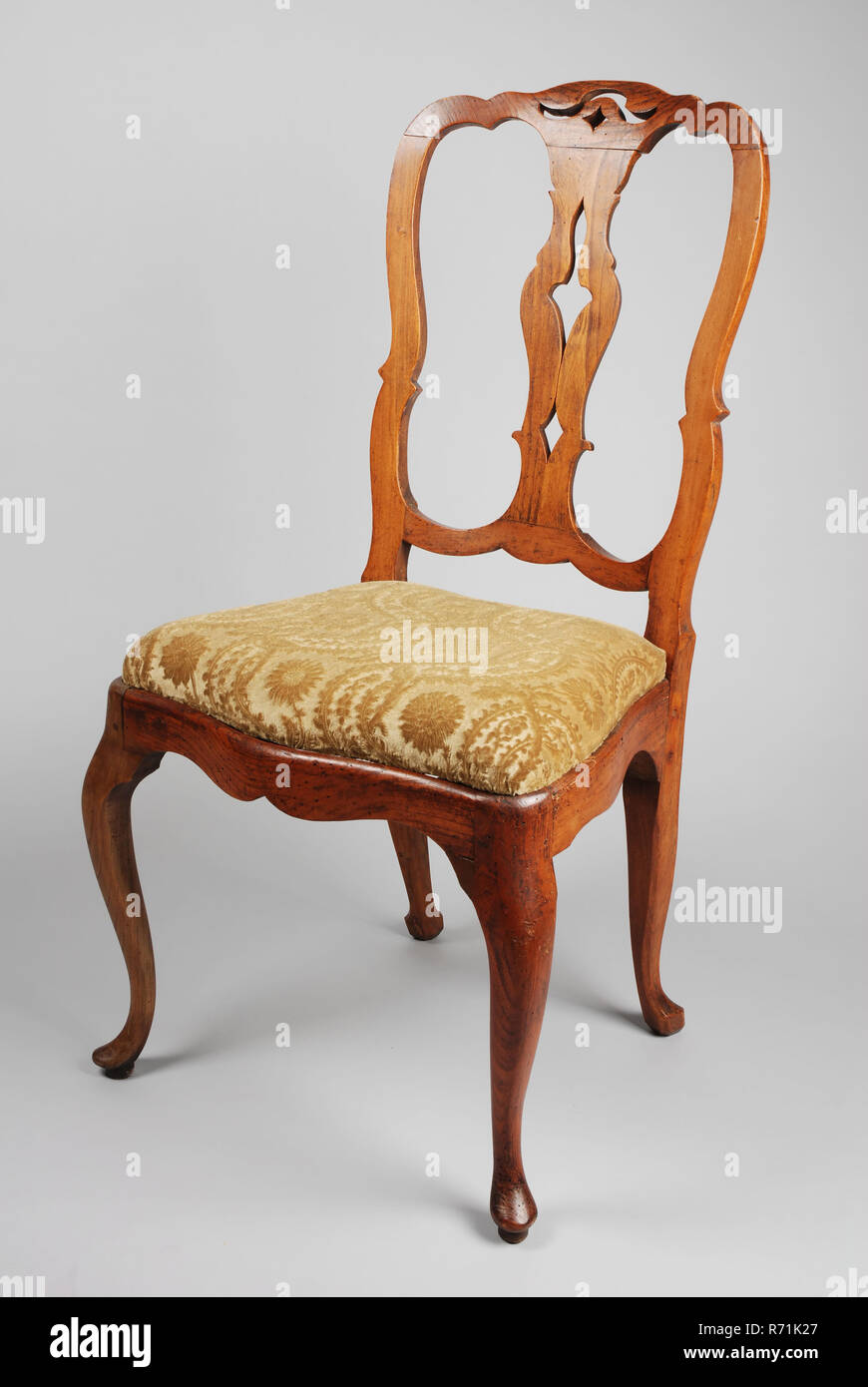 Straight elm wood rococo chair, chair furniture furniture interior design  wood elm wood textile, Openwork backrest modern green ripped upholstery on  loose seat webbing original rococo Stock Photo - Alamy