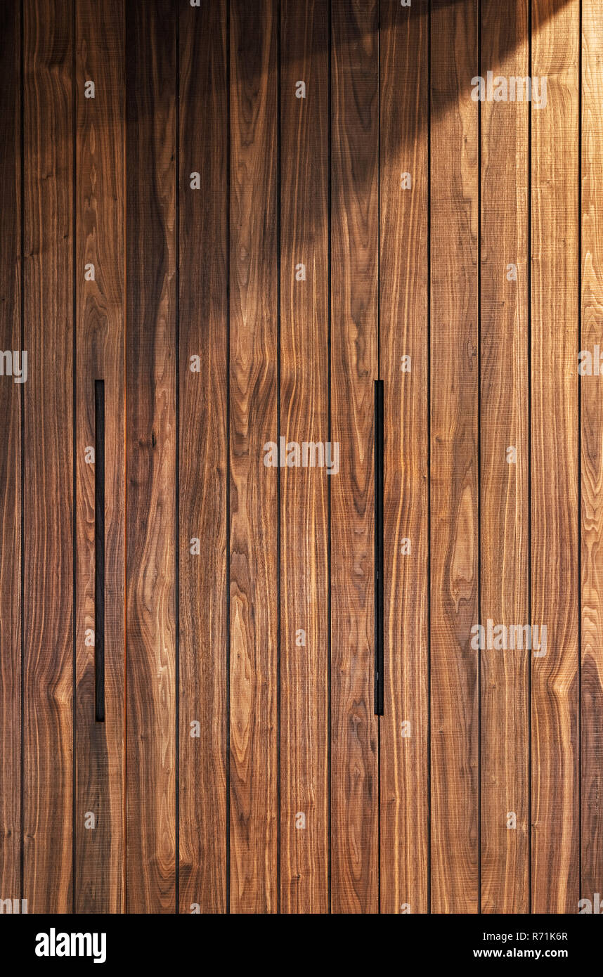 Brown wooden wall, background. Wooden texture, surface. Wooden pattern