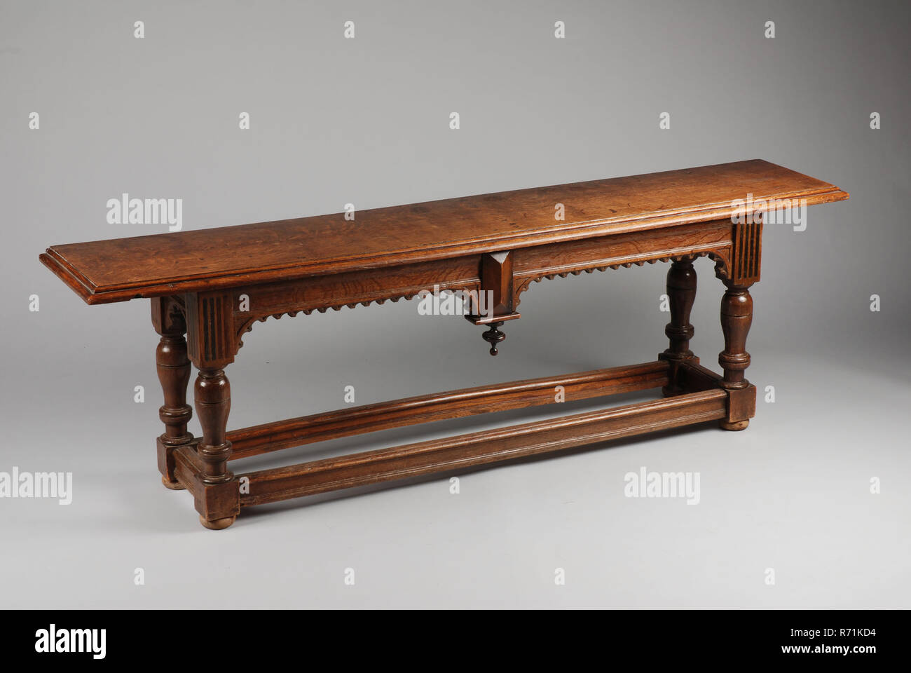 Oak renaissance bench of the Reformed Old Woman's House, bench furniture furniture interior design oak wood moore oak rosewood elmwood wood, Oak Renaissance bench with few marquetry details front with bows and twisted knob baluster legs connected by lines back without decoration Rotterdam City triangle Hoogstraat Gereformeerd Oudevrouwenhuis renaissance Elisabeth Stichting Anno 1455 Reformed Oudevrouwenhuis (St. Elisabeth Gasthuis) Stock Photo