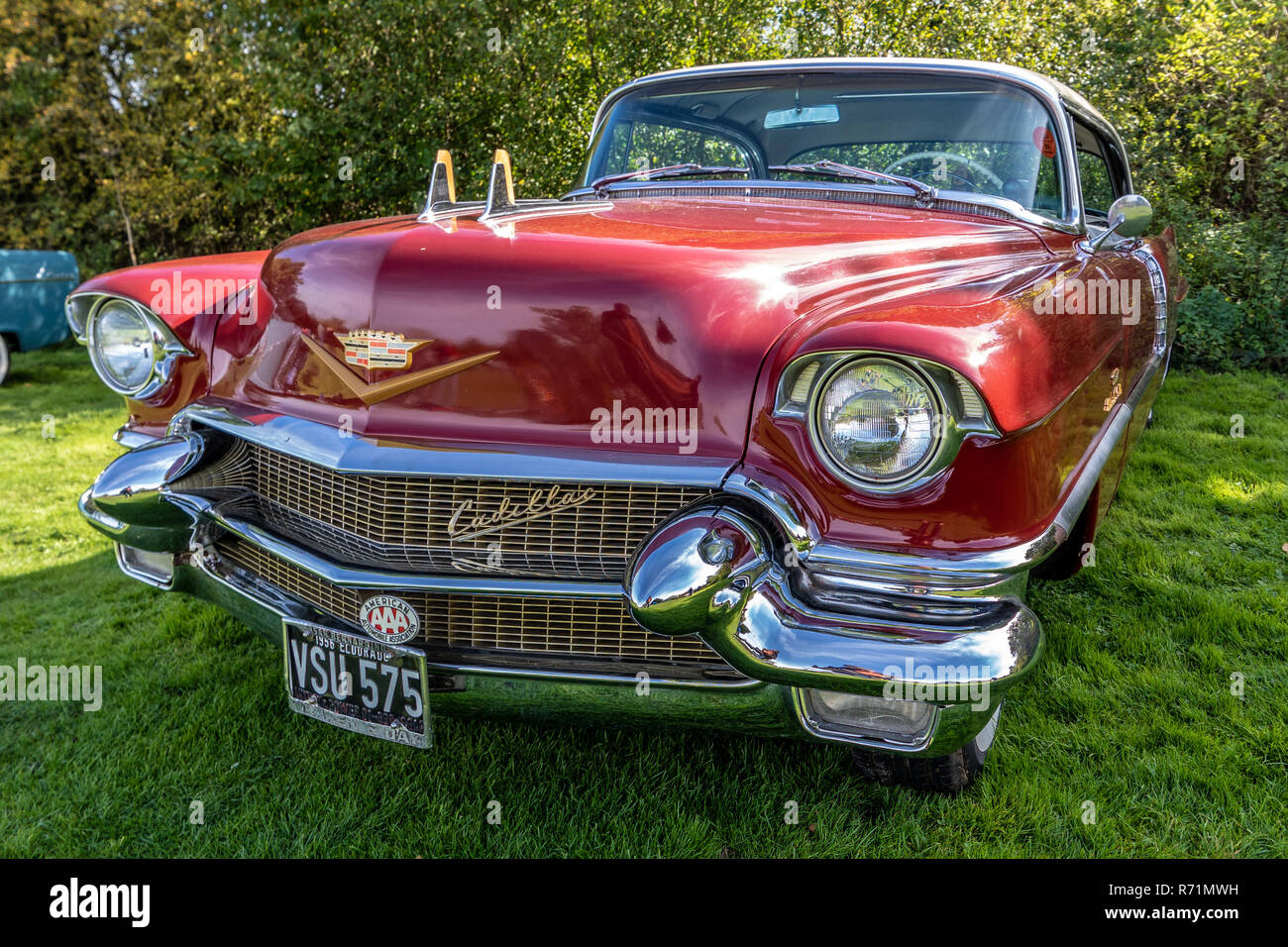 Red 1956 Cadillac Series 62, front grill and bumper overidder. Stock Photo