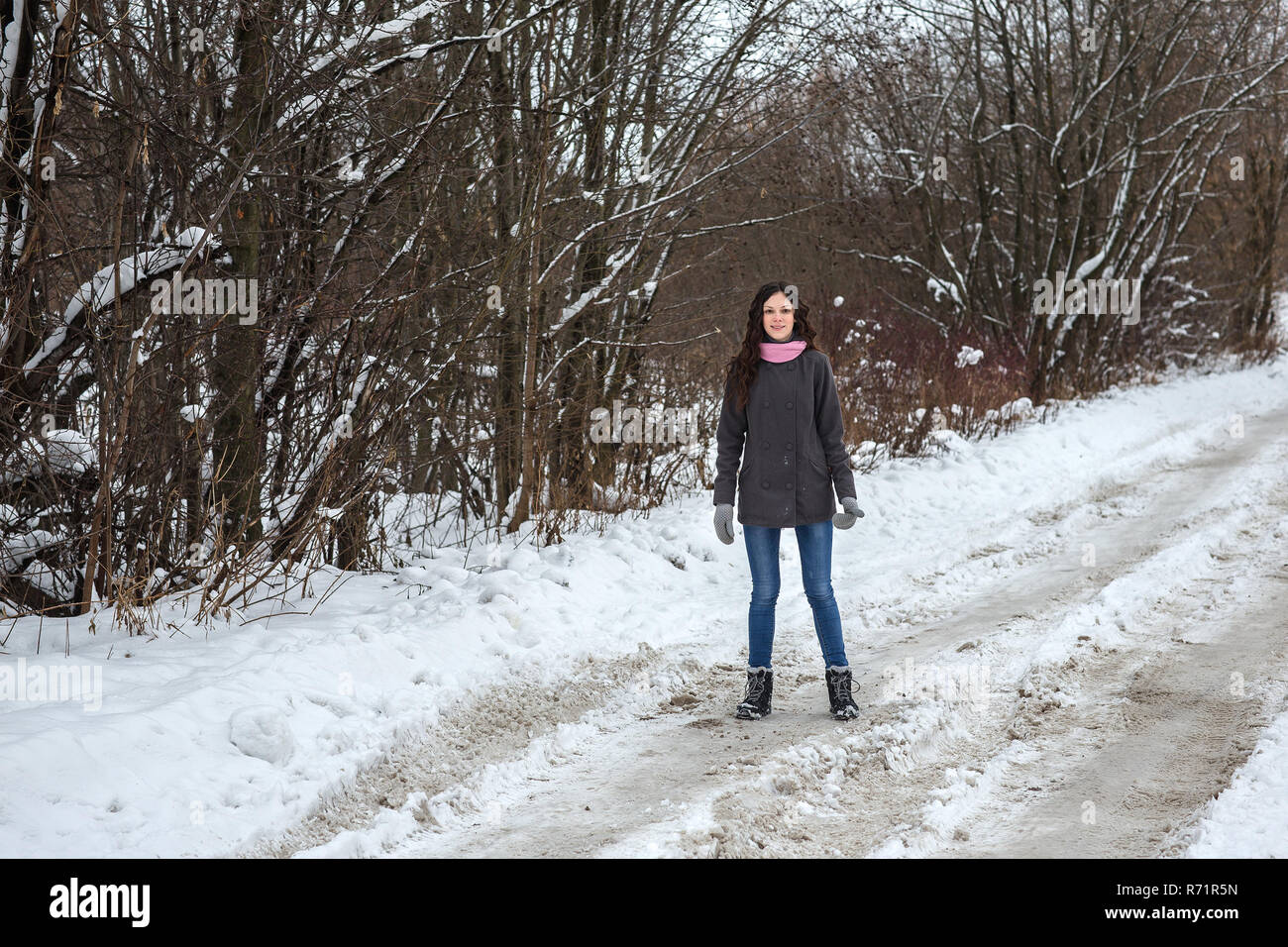 Young girl slip and fall on the snow Stock Photo Alamy