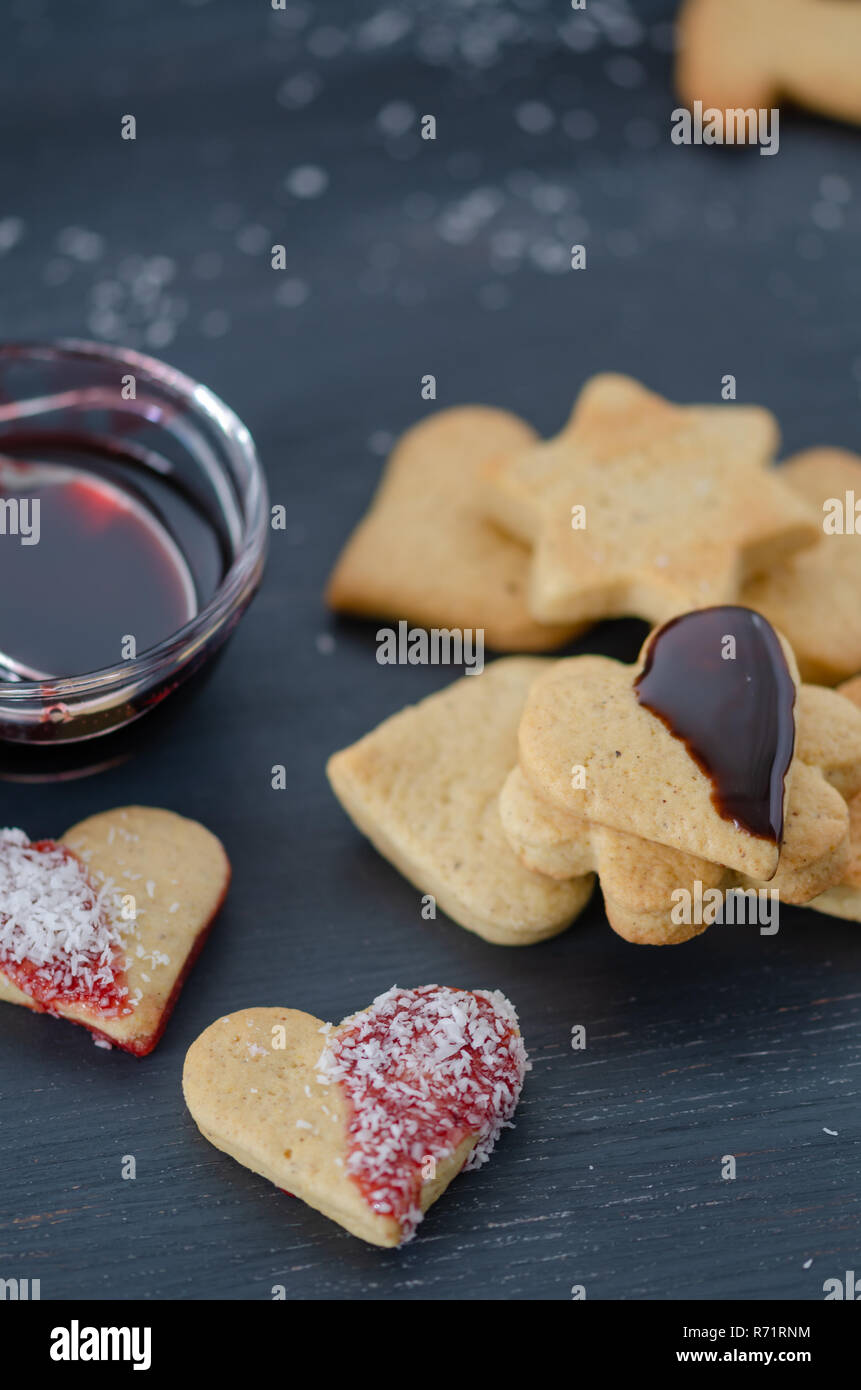 Heart-shaped cookies on a wooden background. Stock Photo