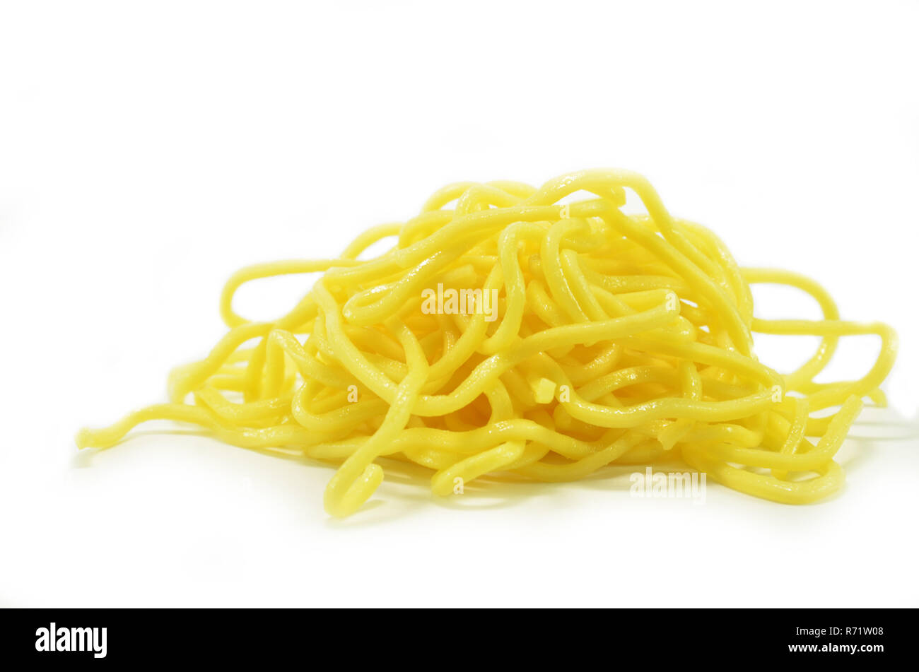 Yellow noodles isolated Stock Photo Alamy