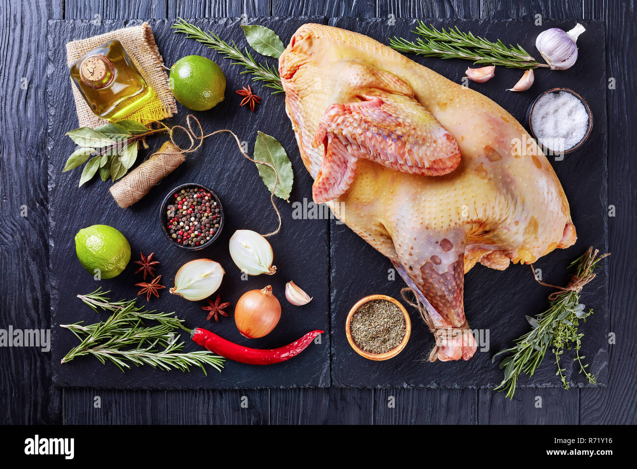 Raw whole chicken fresh herbs hi-res stock photography and images - Alamy