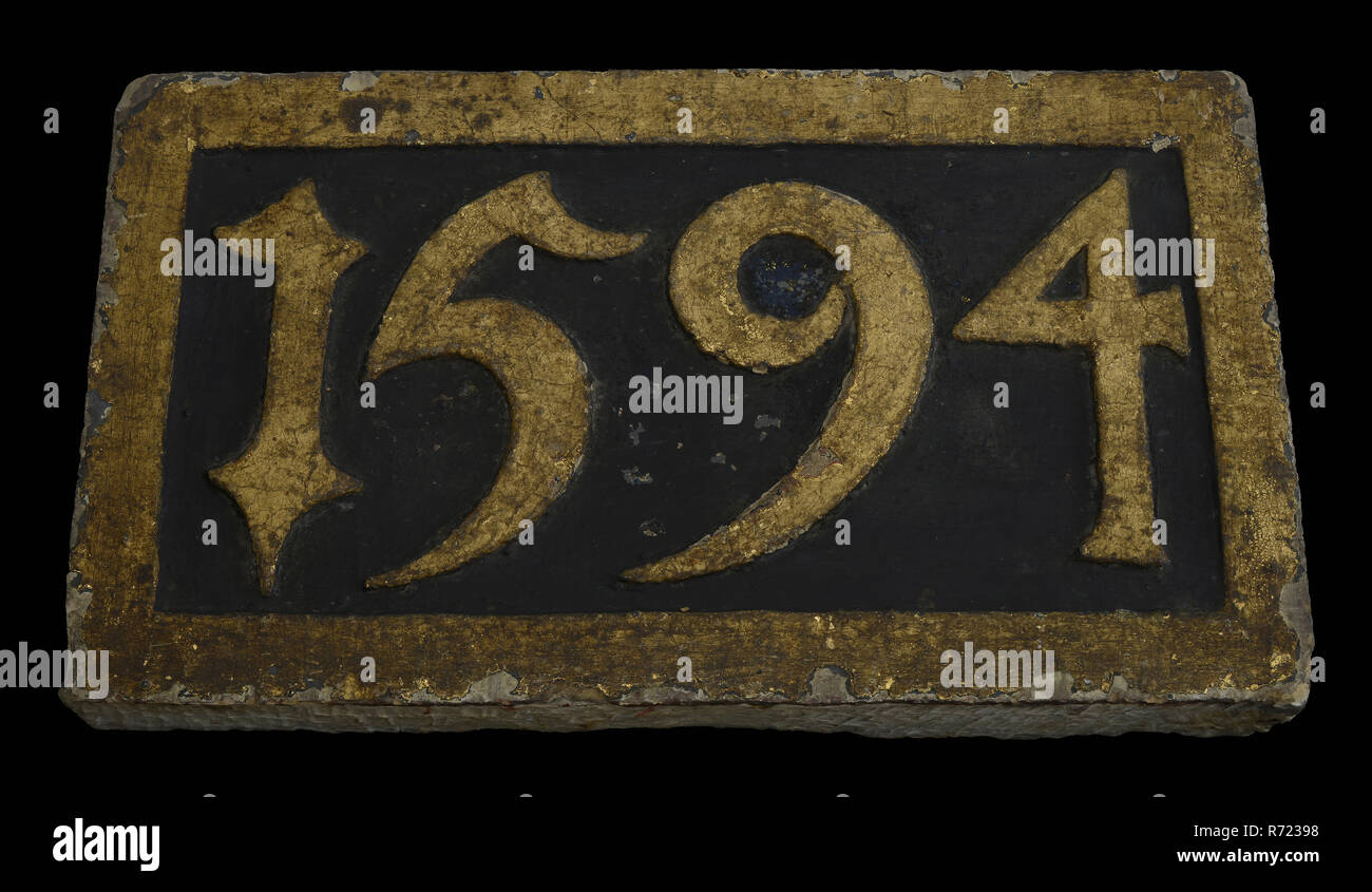stone-with-date-1594-from-house-in-duijsent-vreesen-facing-brick-foundation-stone-building-component-sandstone-stone-paint-minced-rectangular-frame-and-year-in-high-relief-and-gold-painted-surface-black-1594-rotterdam-city-triangle-grotemarkt-in-duijsent-fears-in-thousand-fears-grotemarkt-corner-hang-north-side-rotterdam-R72398.jpg