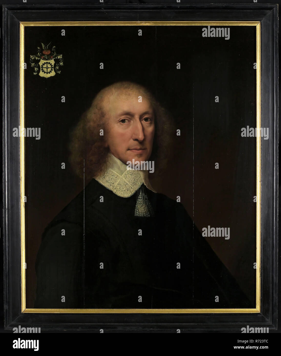 Cornelis Janssens, Jonson van Ceulen, Portrait of Daniël van Hogendorp, portrait painting visual material wood oil, Standing rectangular portrait of man representing Daniël van Hogendorp (1604? -1673) bailiff and dike warden of Schieland member of the knight of Sint Michiel and lord of Moercapelle and Wilde Veenen Principal initiator for the construction of the Schielandshuis and laid the first stone for this on October 31, 1662 Marriage in 1650 with Ida Maria Hooft Calende skull with her shoulders to white collar with lace edge tassel black dress. In the top left corner family coat of arms wi Stock Photo