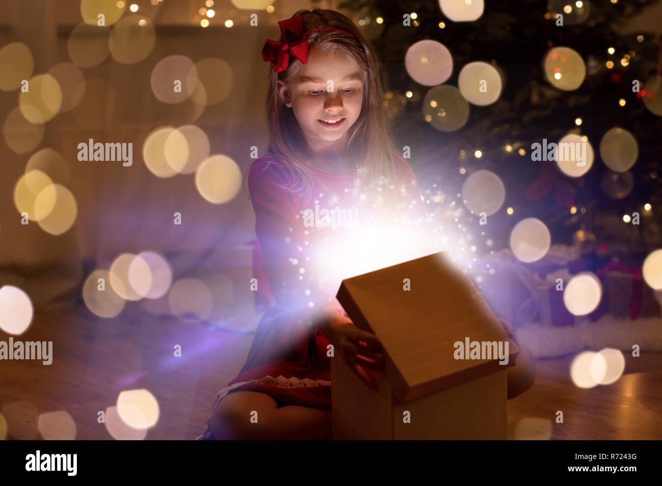 Child opening magic gift box hi-res stock photography and images - Alamy