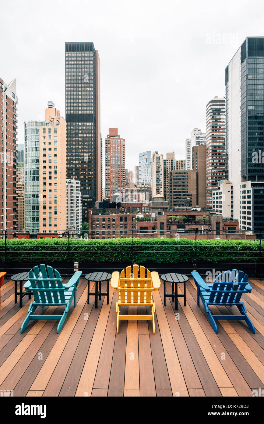 Chairs On A Rooftop And View Of Turtle Bay In Midtown