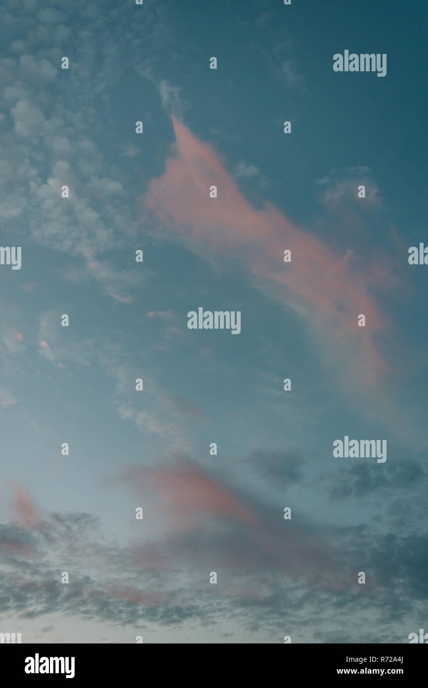 Blue and pink sky at sunset Stock Photo