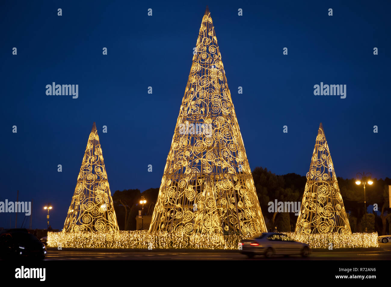 pine tree from yellow lights . Christmas tree with lights glowing