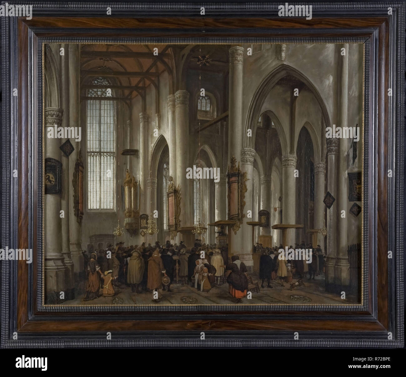 Lieve Verschuier, Interior of the Laurenskerk in Rotterdam, painting footage oil paint linen wood, Landscape format oil on canvas in wooden profile frame Face seen through the nave in the direction of the southern transept. Pastor on pulpit with hourglass Under the audience woman with boy on the hand and pointing woman (kosteres?) With chairs in the right hand canvas bottom right signature (monogram): Lvs architecture genre interior Stadscentrum Stadsdriehoek Rotterdam church Laurenskerk Long-term loan G.Ph . Verhagen-Stichting purchase for the Museum Rotterdam. Stock Photo