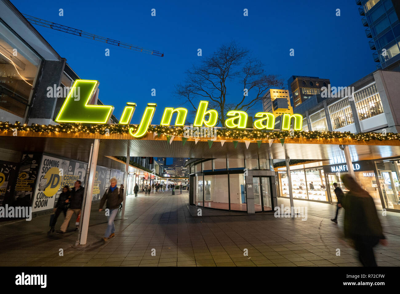 Lijnbaan shopping street at night in Rotterdam, The Netherlands Stock Photo