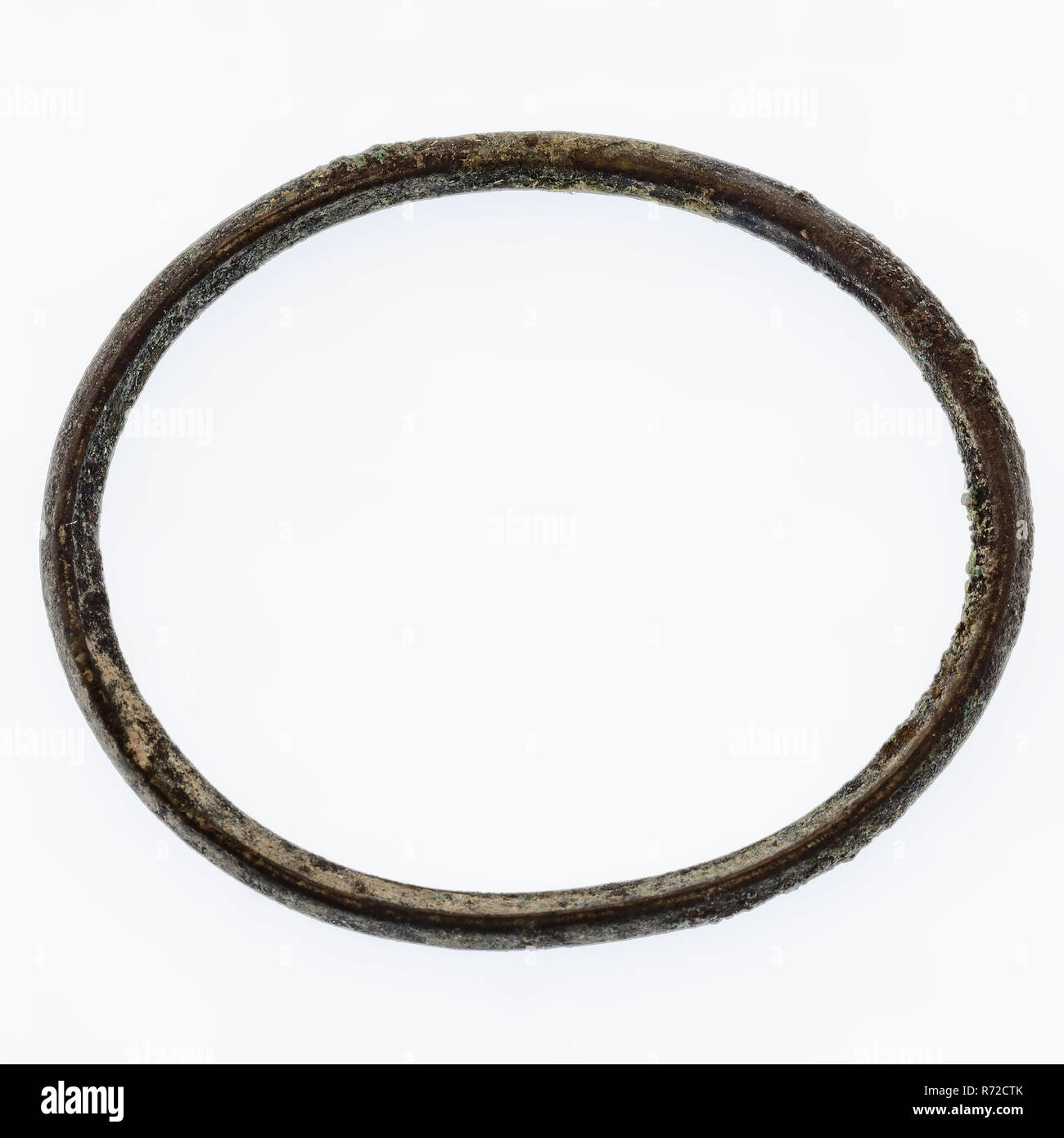 Thin, copper ring, ring part soil find copper metal, Thin copper ring Narrow spine over the inside hemisphere along the outside archeology Rotterdam connecting railway tunnel Soil discovery: Railway tunnel 1988-1993. Stock Photo
