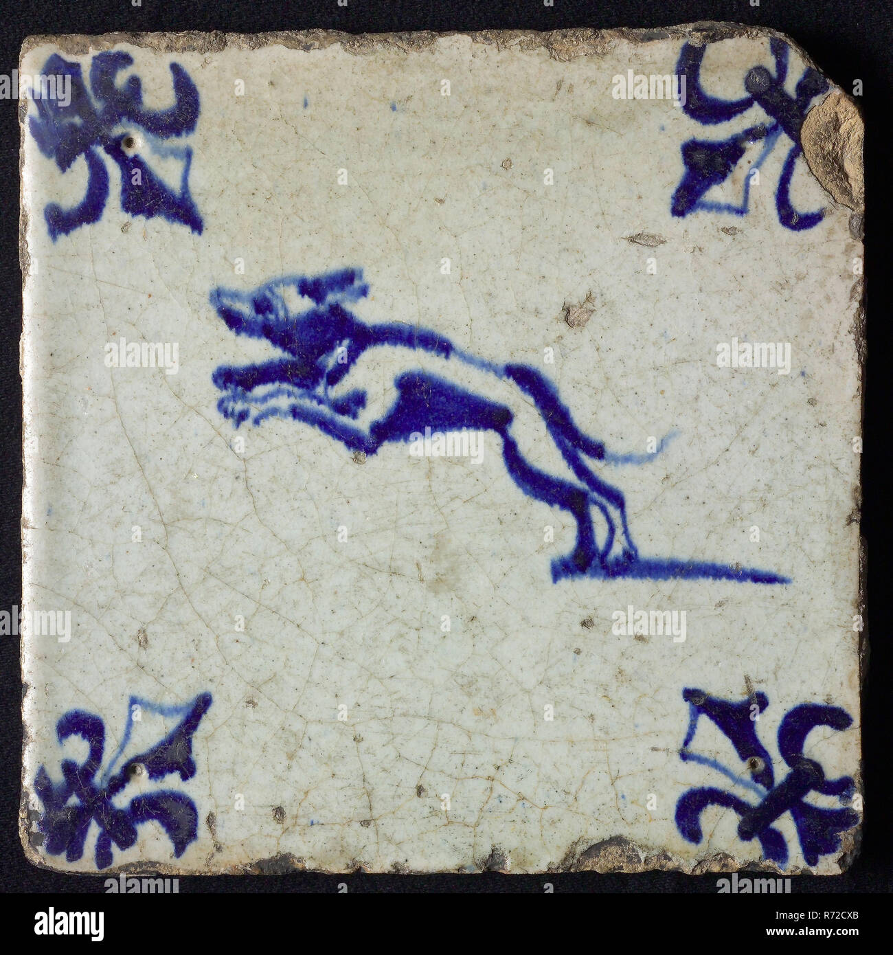Animal tile, jumping dog, blue on white, corner pattern lily, wall tile