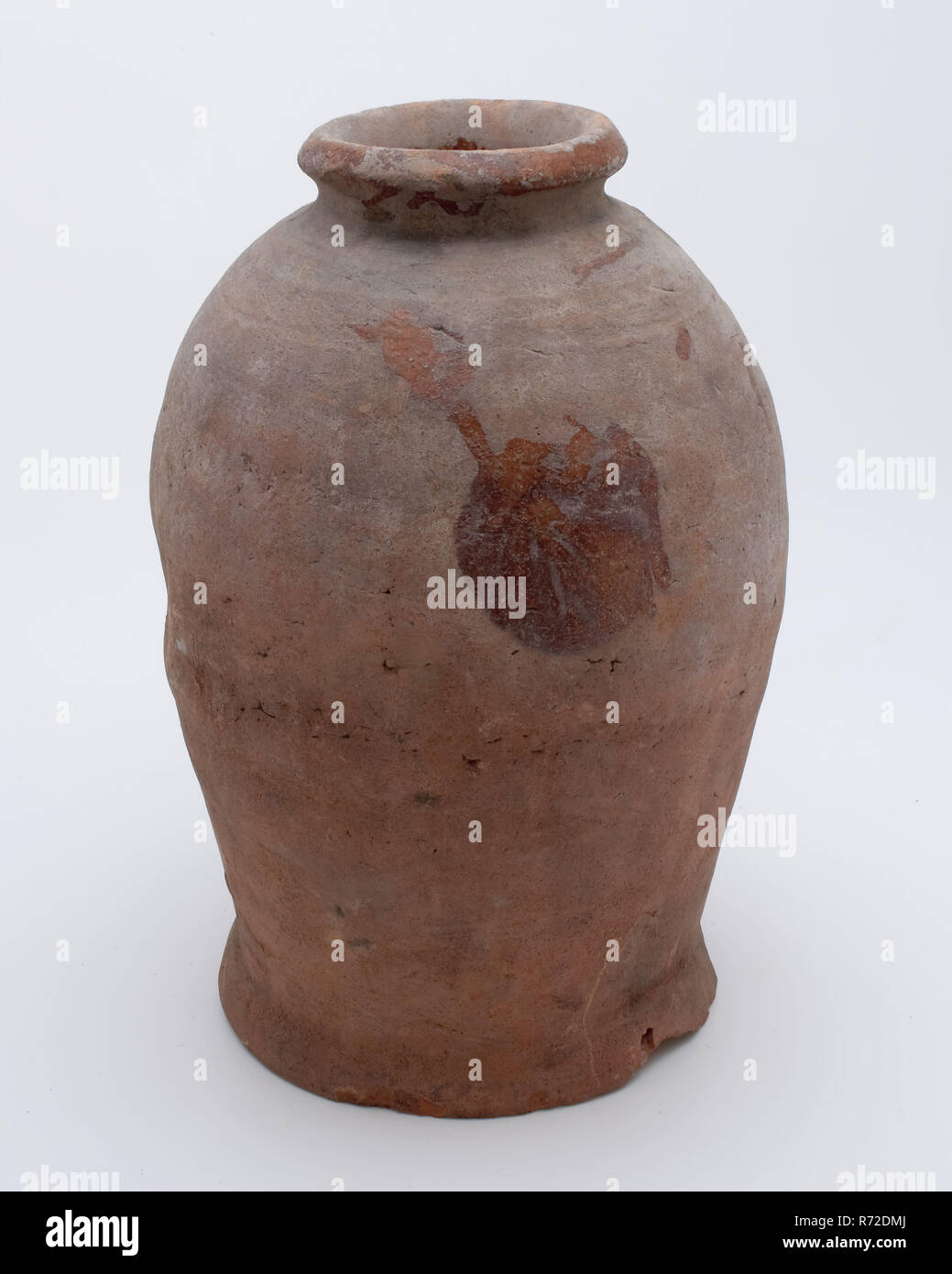 Pottery pot on stand, baluster shape, used in the sugar industry, sugar bowl pot holder soil find ceramic earthenware glaze lead glaze, hand turned glazed earthenware pot on stand. Baluster shape with round shoulder and narrow neck opening Thick and rounded neckline including waistline. Red shard internally glazed Blurred spinning of the entire height and shallow dent in the sidewall under the arch archeology indigenous pottery sugar sugar industry confectionery Stock Photo