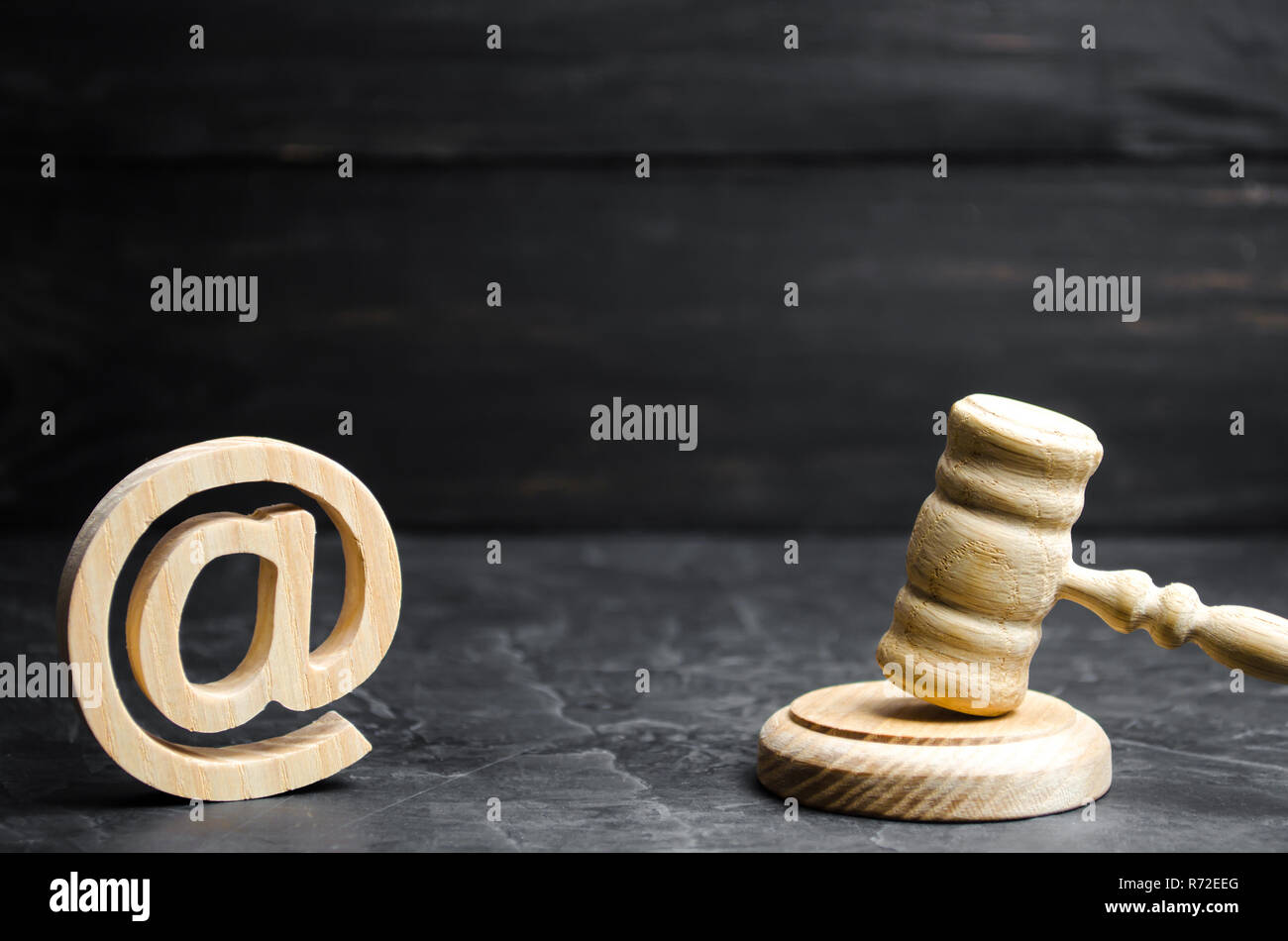 Judge's hammer and email address. The concept of legal proceedings for the seizure of rights to use the names of mail and websites. Confiscation of do Stock Photo