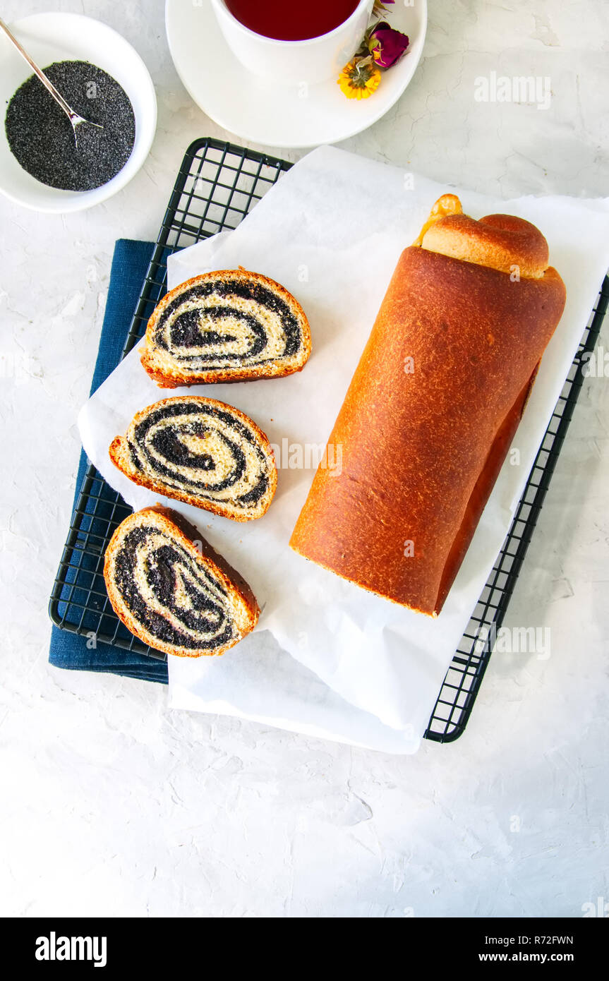 Traditional polish festive pastry Makowiec Poppy seed roll on a wire