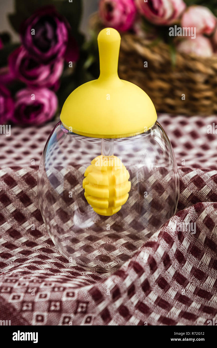 Download Empty Glass Honey Jar With Yellow Cap On Fabric Tablecloth Stock Photo Alamy Yellowimages Mockups