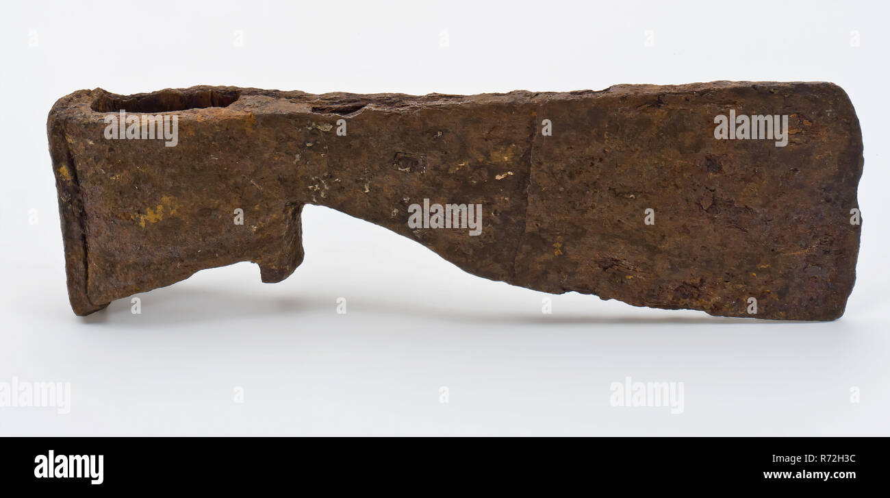 Head of ice ax, elongated narrow ax, ax tool equipment soil find iron metal, forged Head of ice ax. Elongated leaves Right at the top. Oblique notch at the bottom between blade and tube. Tube with slanted bottom and rectangular shank for the seat of the handle Marked on the side of the blade on unclear mark: 8 or archeology Rotterdam rail tunnel wood processing chopping ice free Soil discovery: rail tunnel Rotterdam. Stock Photo