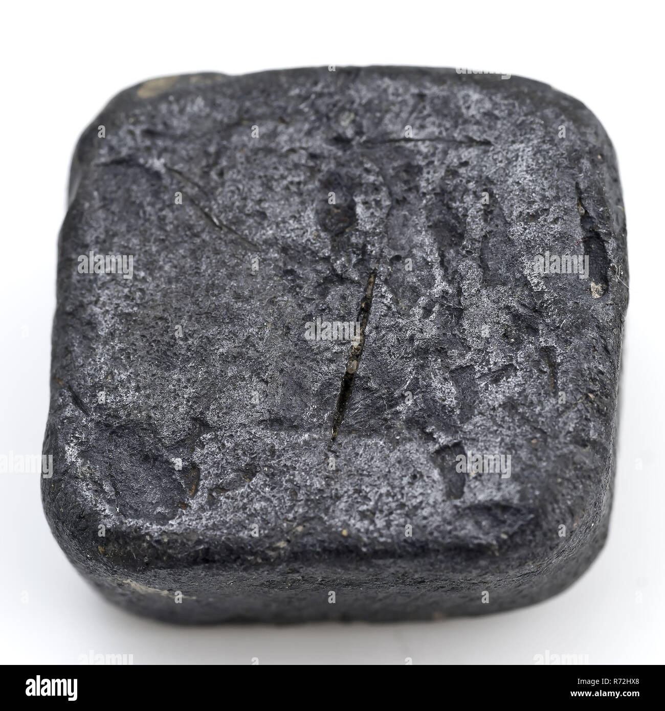 Rectangular solid lead block, artifact soil find lead metal, gram cast Rectangular solid metal block. Unnoticed and function unknown archeology Rotterdam railway tunnel Soil discovery Rotterdam tunnel trajectory. Stock Photo