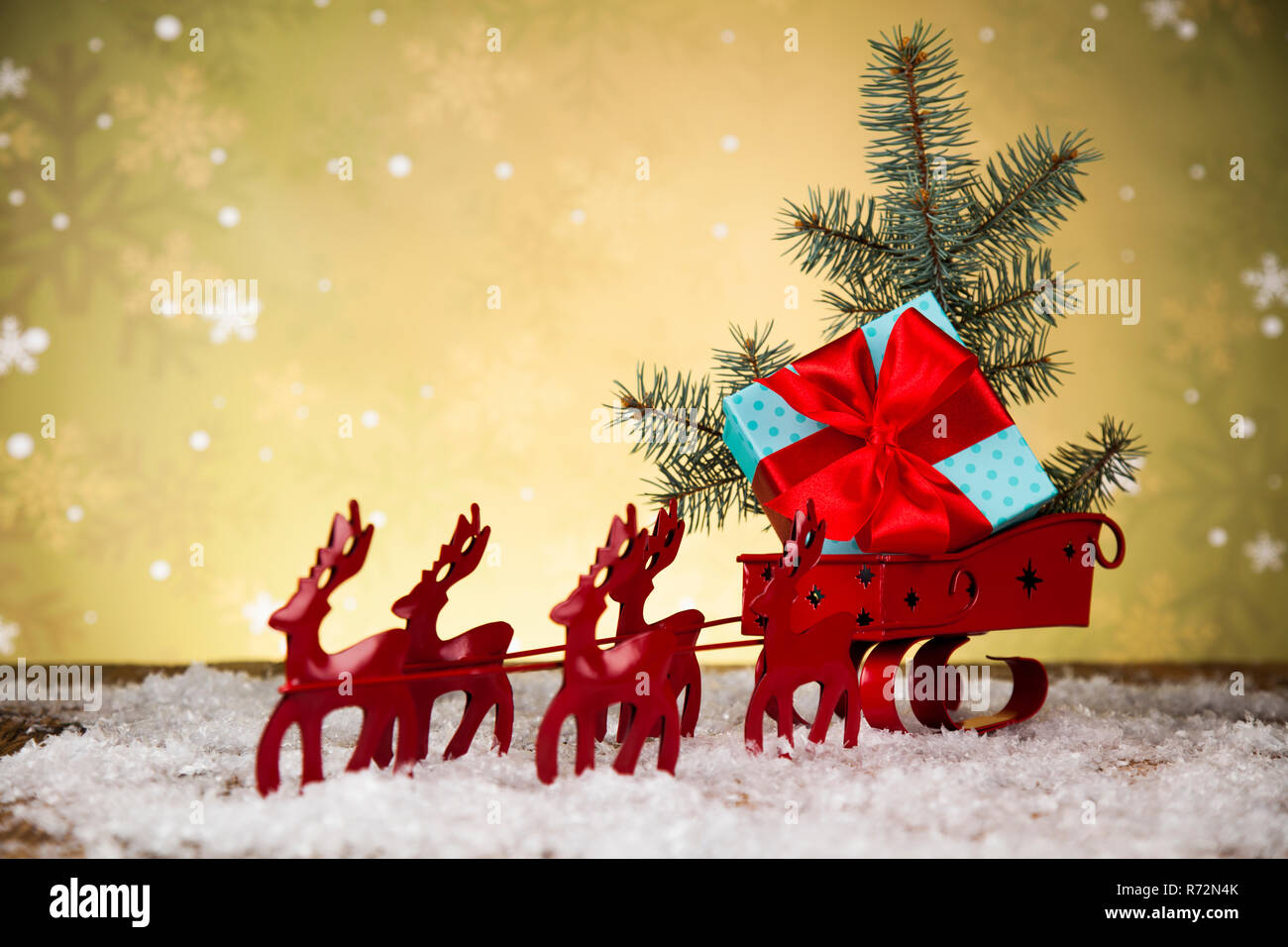 Santa sleigh on gift box background Stock Photo - Alamy