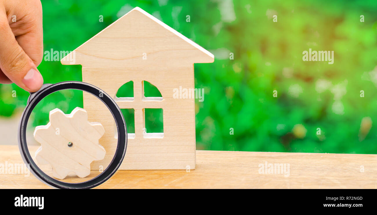 Wooden House And Gear Concept Of Project Development Energy