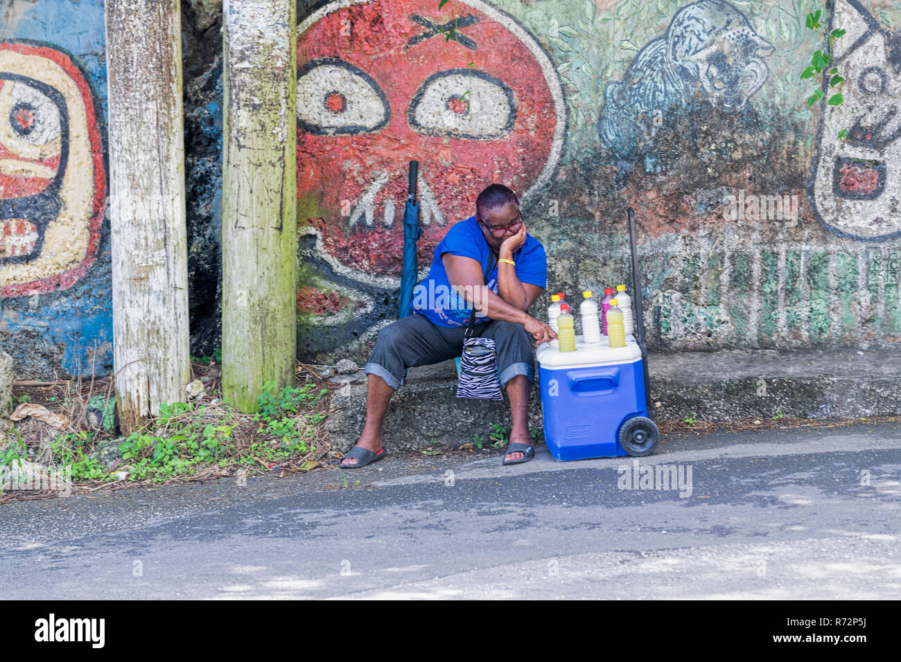 Lady selling cold drinks barbados hires stock photography and images