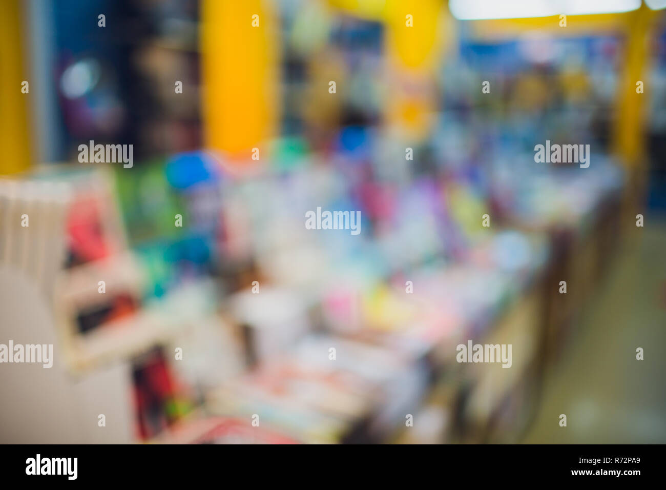 Comic books in bookshelf for background store Stock Photo - Alamy