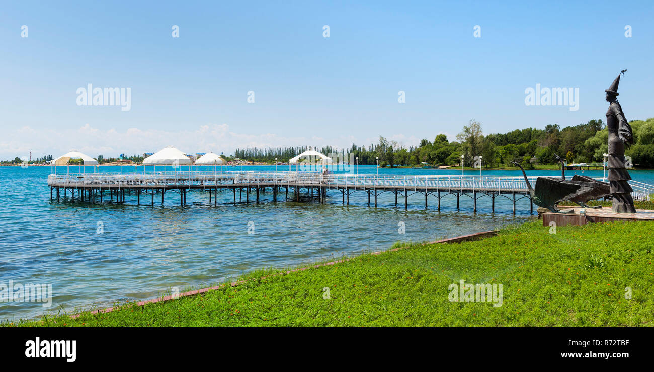 Pier of the Ruh Ordo Cultural complex named after famous Kyrgyz writer Chinghiz Aitmatov, Issyk Kul lake, Cholpon-Ata, Kyrgyzstan Stock Photo