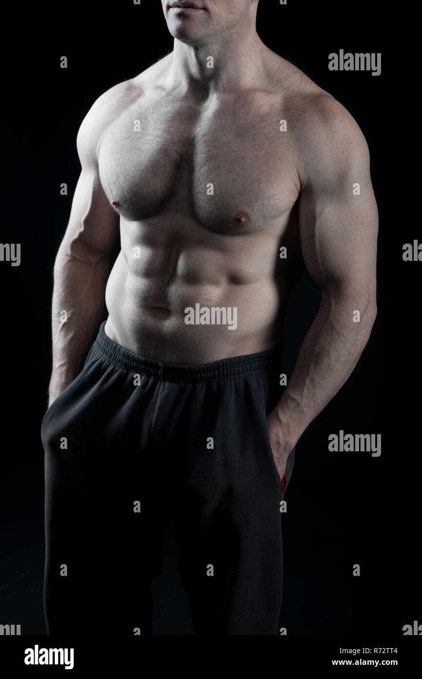 Torso with six pack and ab muscles. Torso with fit belly and athletic