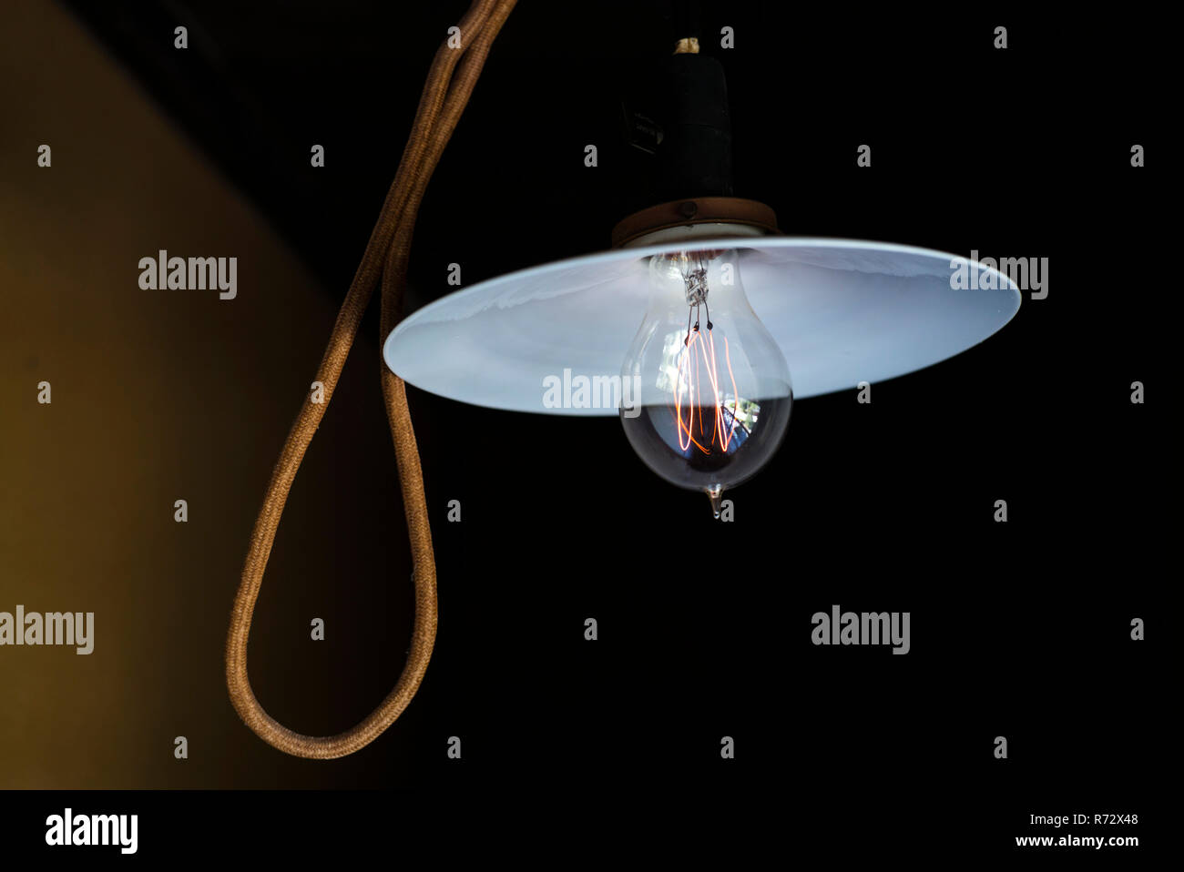 Historic hanging lamp with Edisonstyle lightbulb Stock Photo Alamy