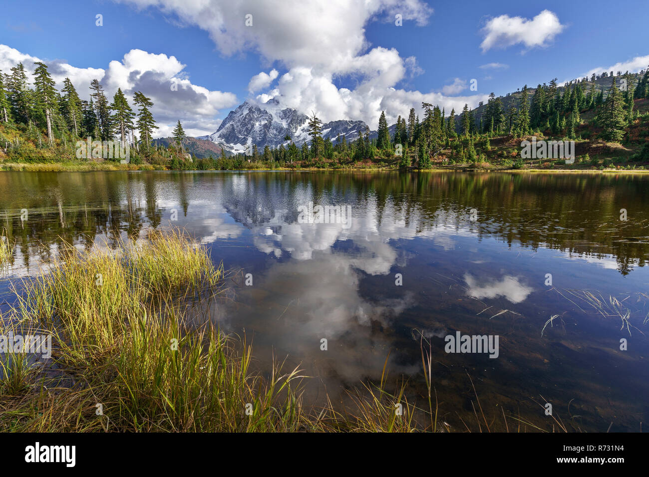 Mount Shuksan is a prominent mountain in the Pacific Northwest in the Mount Baker Wilderness Stock Photo