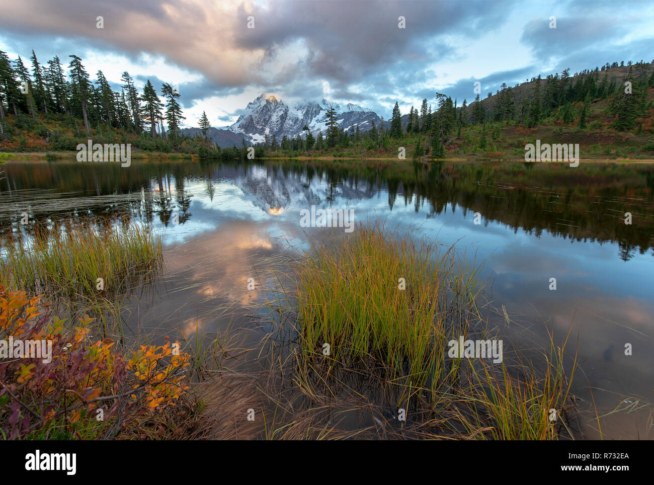 Mount Shuksan is a prominent mountain in the Pacific Northwest in the Mount Baker Wilderness Stock Photo