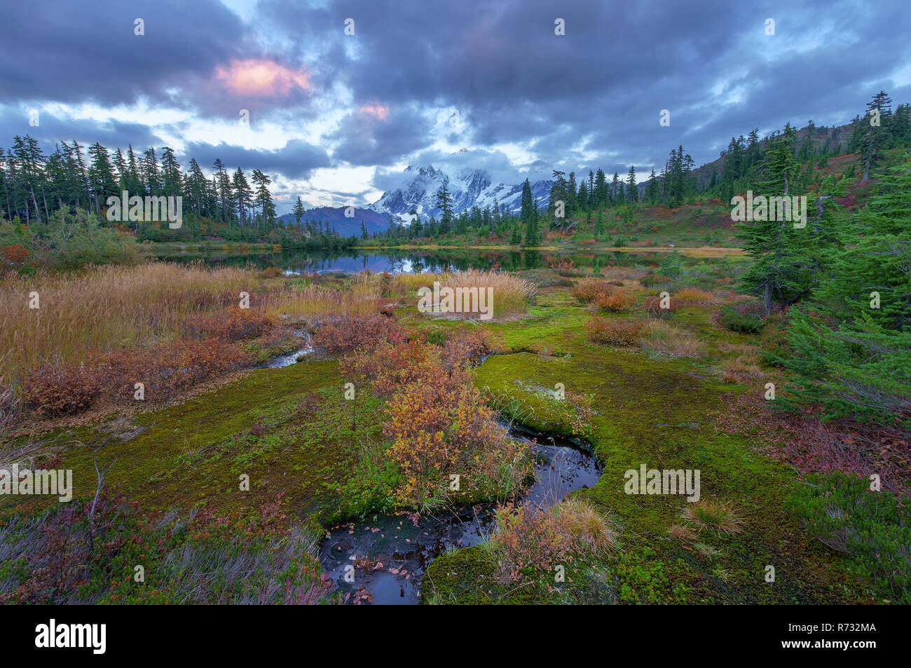 Mount Shuksan is a prominent mountain in the Pacific Northwest in the Mount Baker Wilderness Stock Photo