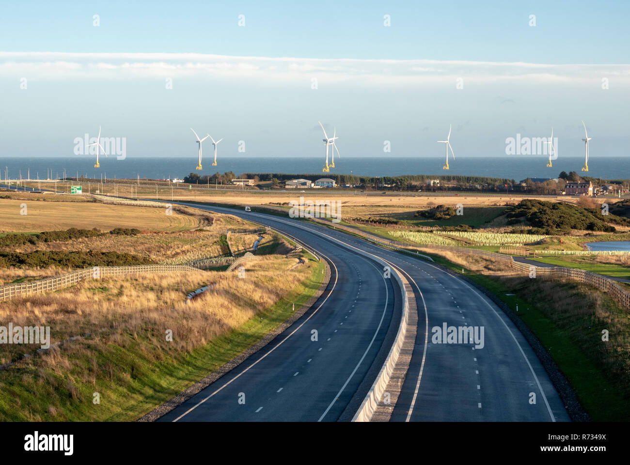 View of the new Aberdeen bypass road looking toward offshore wind farm Stock Photo