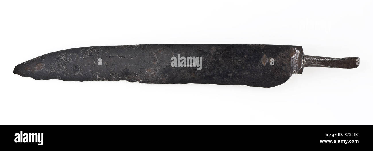 Hand-forged blade with short baffle with angel, marked on blade with crowned V, blade knife cutlery ground find iron metal, mark on blade with crowned V archeology underground pit Rotterdam City center Stadsdriehoek Oostplein Soil discovery: underground pit Oostplein 11061976 Stock Photo