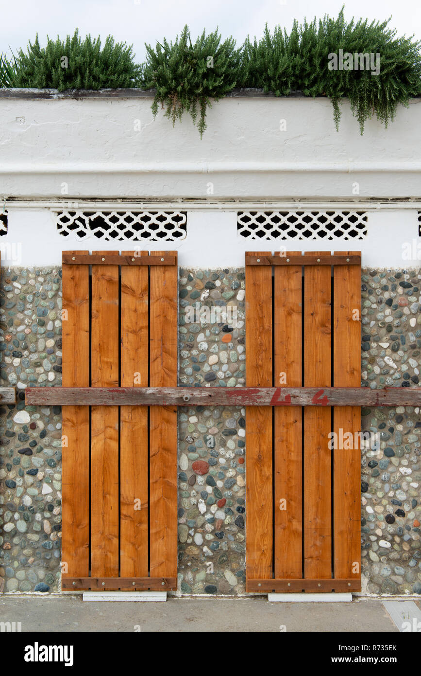 Doors covered and locked with wooden planks to protect them from winter